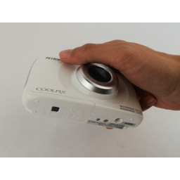 Nikon Coolpix S33 Замена батареи и SD-карты